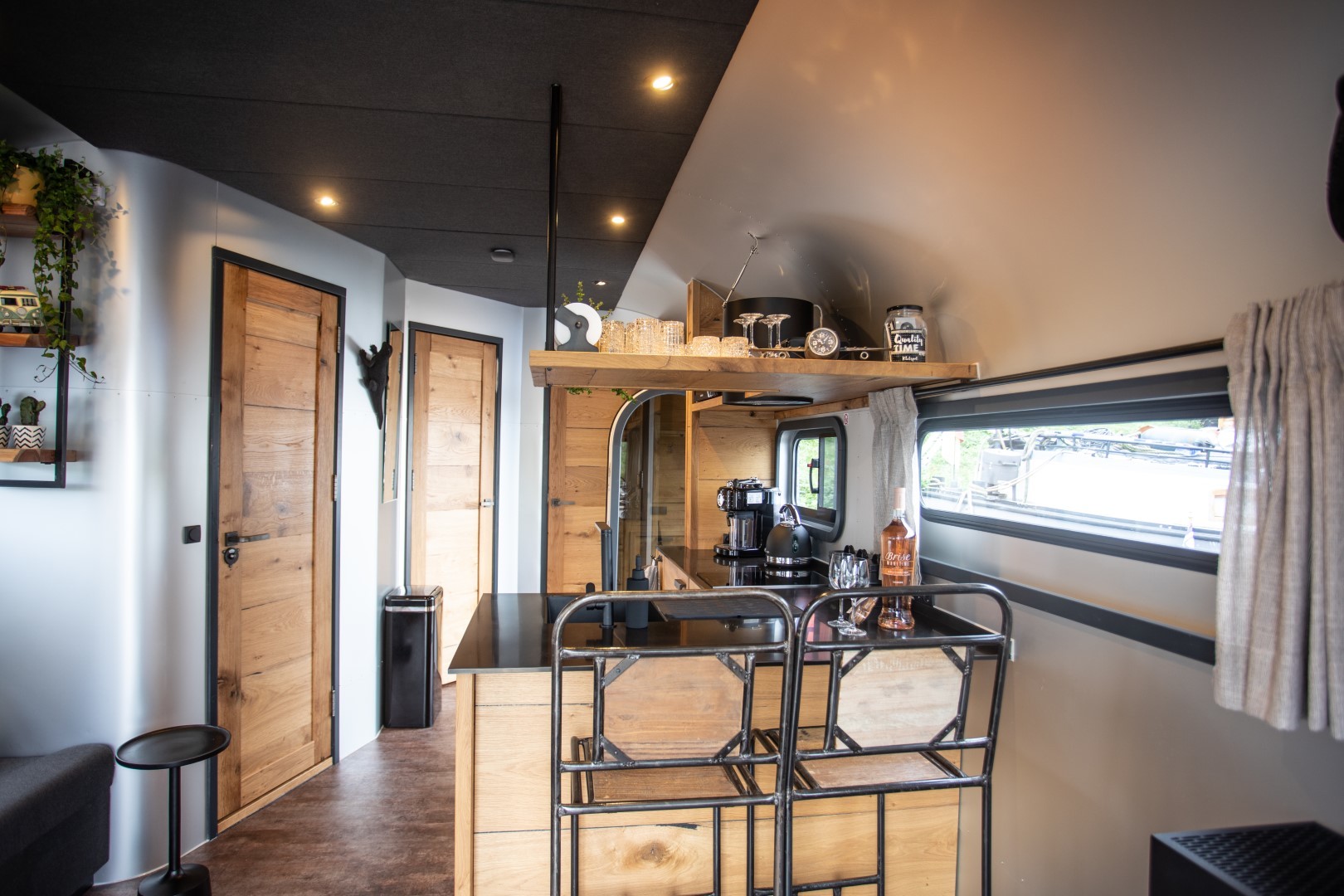The Coon 1000 Houseboat