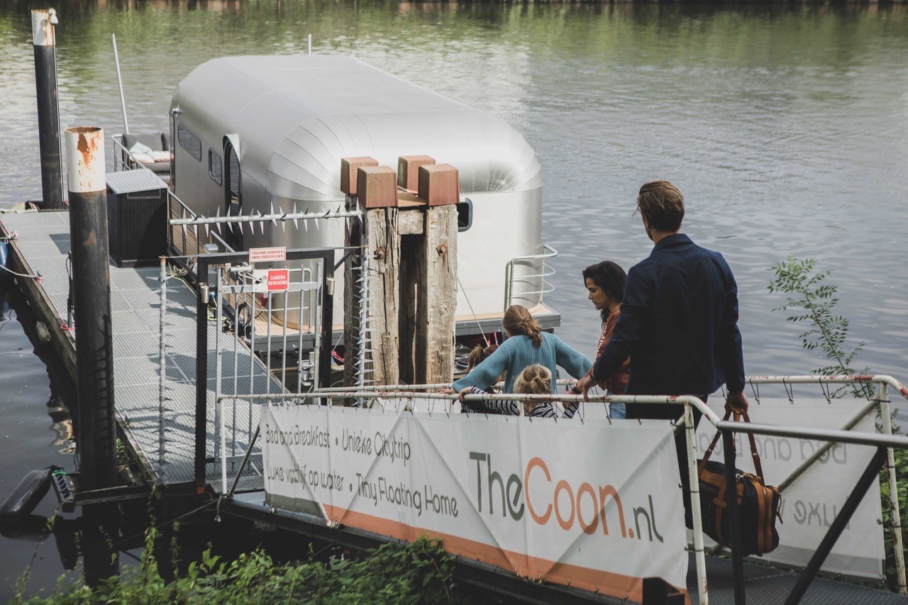 The Coon 1000 Houseboat